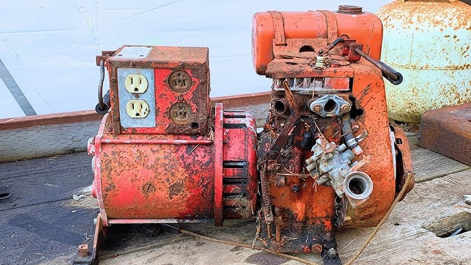 Old red portable generator ready for scrap recycling